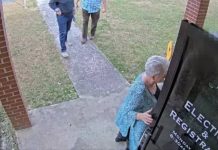 Surveillance Video Shows Fake Trump Elector Escorted Operatives Into Elections Office