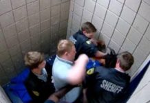 Video Shows Corrections Officers Beating Black Man In Custody