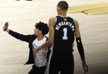 Fan Arrested And Banned For Life After Running Onto Court To Take Selfie With Victor Wembanyama